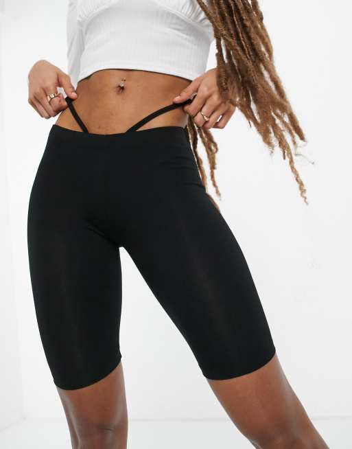 ASOS DESIGN low rise legging short with strap detail in black