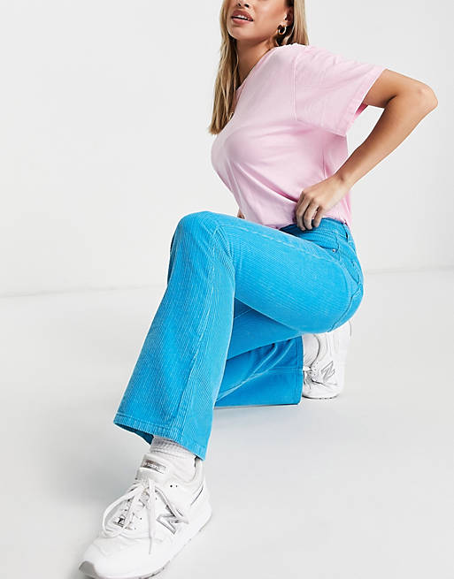 Women low rise rigid flared jeans in blue cord 
