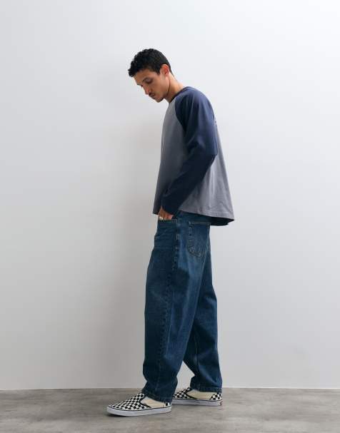 ASOS DESIGN low rise slim barrel jeans in dark wash blue - view 1