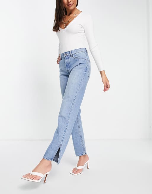 ASOS DESIGN low rise straight leg jeans in midwash with split hem