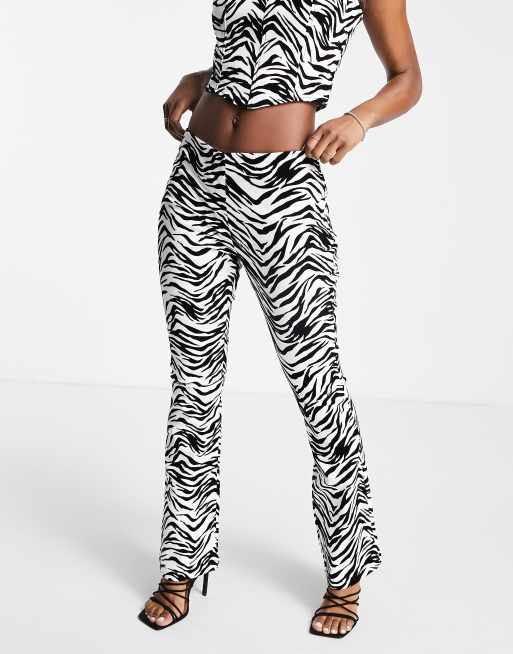 ASOS DESIGN low rise zebra flare pants in black velvet (part of a set)