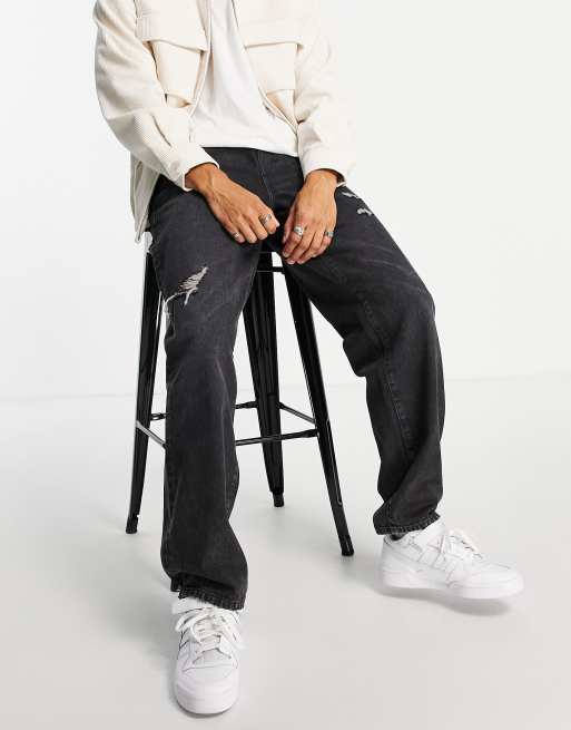 ASOS DESIGN - Løstsiddende jeans med flænger i sort vask 
