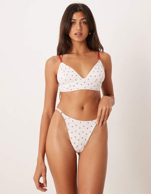 ASOS DESIGN - Lulu - Reggiseno morbido taglio lungo bianco con cuori floccati rossi