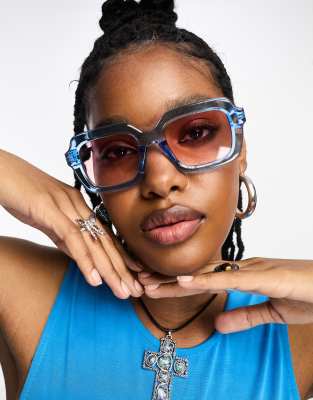 ASOS DESIGN Lunettes de soleil a monture epaisse rectangulaire et verres rose clair Bleu transparent ASOS