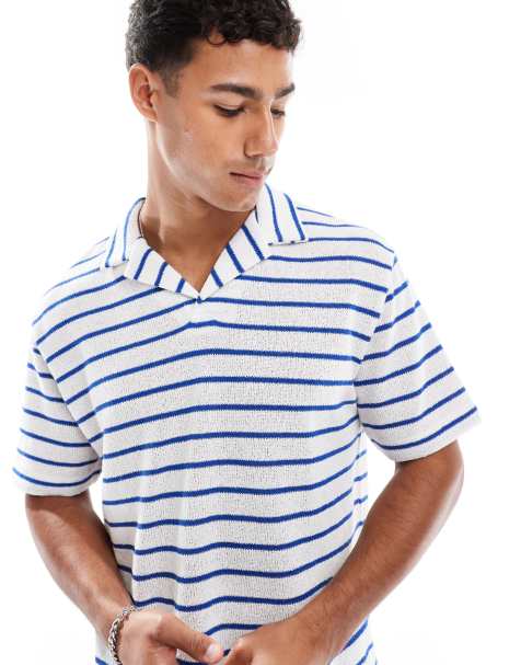 ASOS DESIGN relaxed polo with revere collar in textured blue and white stripe 