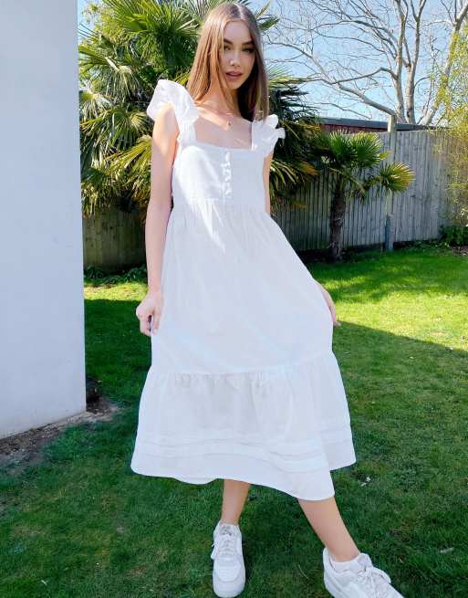 ASOS DESIGN – Luźna letnia lniana sukienka midi w kolorze białym z falbanką i dekoltem karo