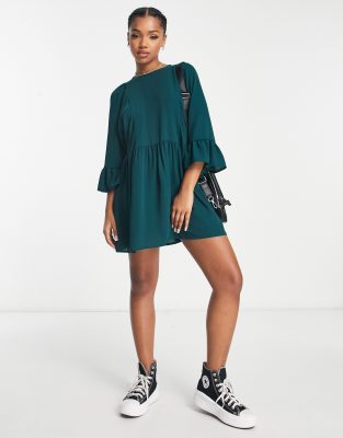 ASOS DESIGN – Luźna sukienka mini w kolorze butelkowej zieleni z nietoperzowymi rękawami