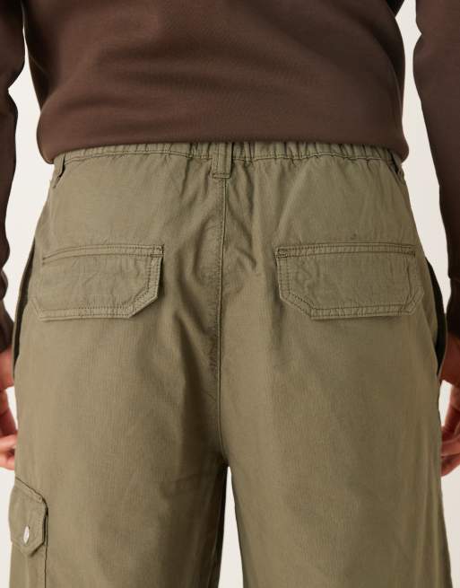 ASOS DESIGN – Luźne zwężane bojówki ściągane na sznurek w kolorze khaki, 5 z 5