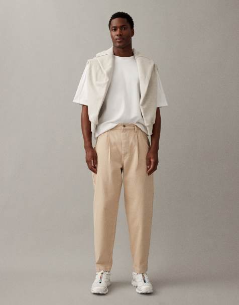 ASOS DESIGN – Luźne zwężane jeansy w kolorze ecru - view 1