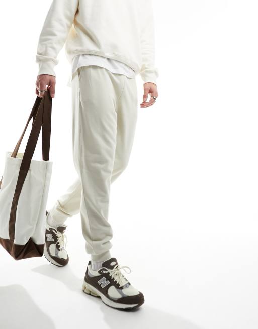 ASOS DESIGN - Lyse og beige joggingbukser med indsnævrede ben