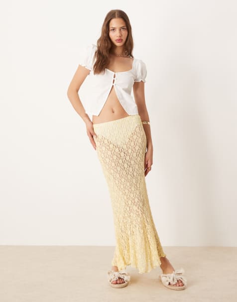 ASOS DESIGN - Lysegul midinederdel i transparent blondestof med kileindsatser forneden - view 1