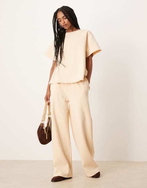 ASOS DESIGN - Lysegule bukser med vide ben og interlock-syninger - view 1