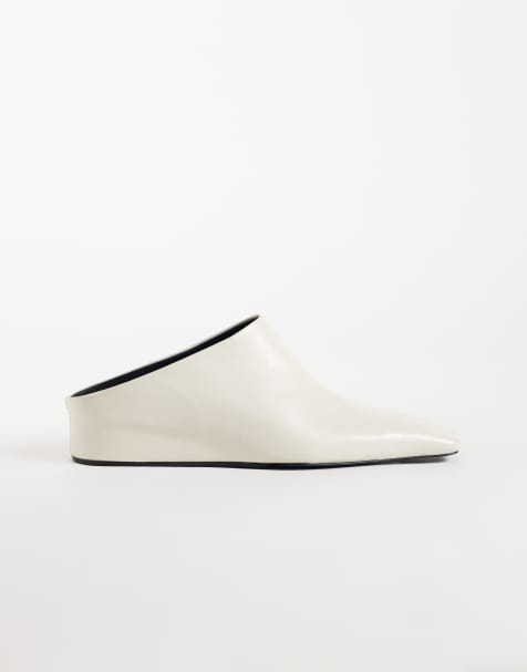 ASOS DESIGN Maeve real leather concealed wedge mules in off white - view 1