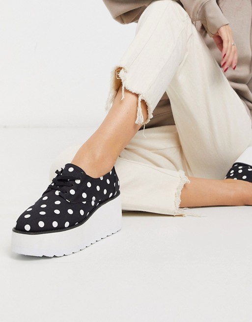 ASOS DESIGN Magician chunky lace up flat shoes in polka dot