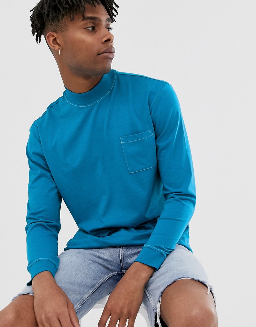 ASOS DESIGN - Maglietta comoda a maniche lunghe blu con cuciture a contrasto e tasca