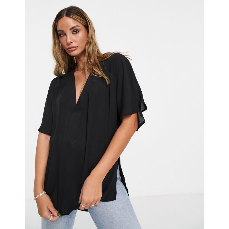 Camicie e bluse Top DESIGN - Maglietta oversize con scollo a V e spacco sul fondo nera 