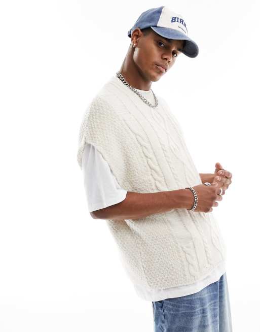 ASOS DESIGN - Maglione senza maniche oversize lavorato a trecce beige con dettagli invecchiati
