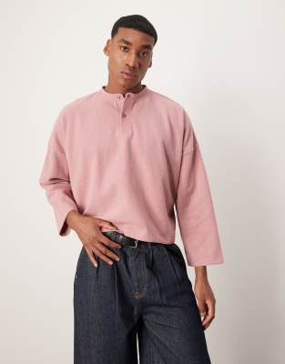 ASOS DESIGN - Maglione super oversize taglio corto in tessuto pesante rosa a coste con scollo serafino