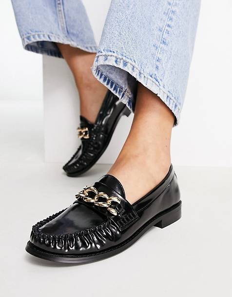 Moschino Leer Loafers Met Logoplakkaat in het Zwart Dames Schoenen voor voor Platte schoenen voor Loafers en mocassins 