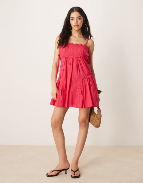 ASOS DESIGN babydoll mini dress with ruffle hem in raspberry