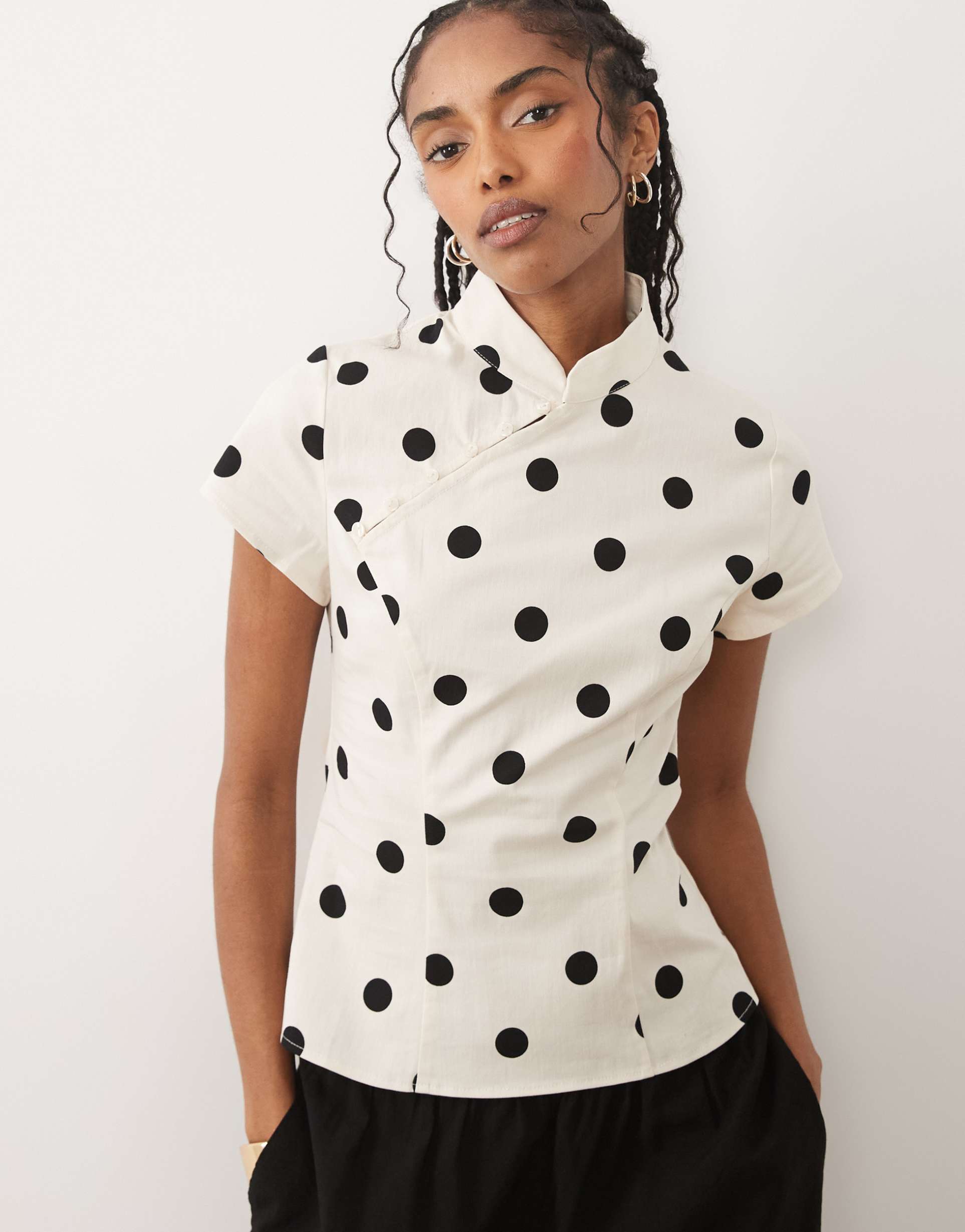 asos design mandarin collar with asymmetric button detail top in cream polka dot print