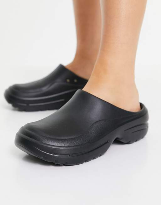 ASOS DESIGN – Manta – Svarta tofflor i träsko-modell