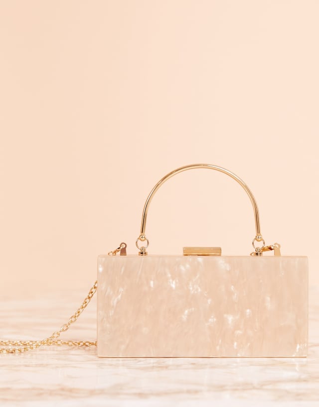 ASOS DESIGN marble clutch bag with metal handle