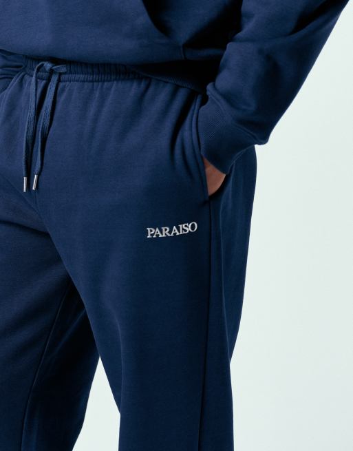 ASOS DESIGN – Marinblå, avslappnade mjukisbyxor med tryck, del av set, 4 av 5