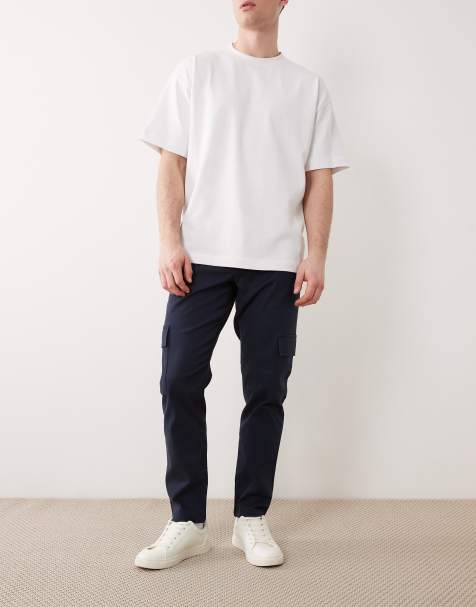 ASOS DESIGN – Marinblå avsmalnande cargobyxor - view 1