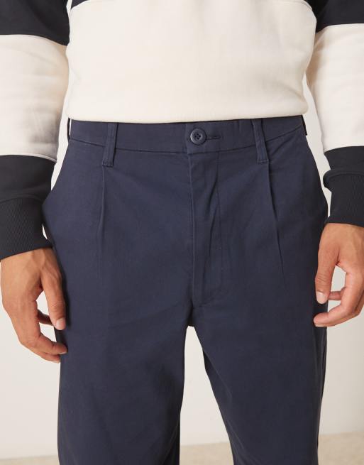 ASOS DESIGN – Marinblå, avsmalnande chinos med veck och avslappnad passform, 4 av 5