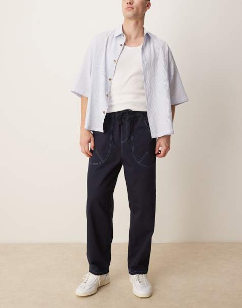 ASOS DESIGN – Marinblå byxor i nylon med baggy-stil och kontrasterande sömmar - view 1