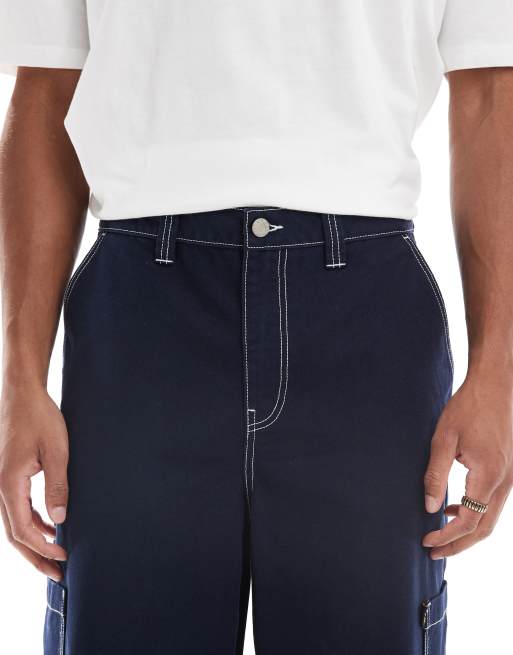 ASOS DESIGN – Marinblå cargobyxor i superbaggy-stil med broderade bakfickor, 3 av 5