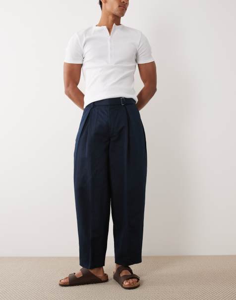 ASOS DESIGN – Marinblå, figursydda byxor i linnerikt tyg med vida barrelben och skärp - view 1