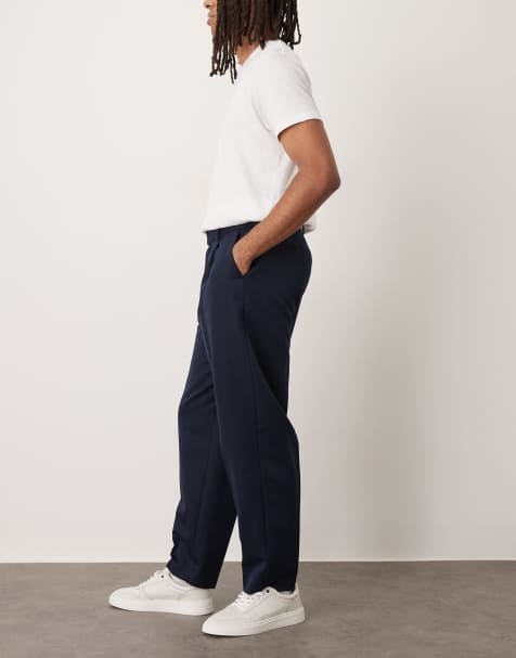 ASOS DESIGN – Marinblå finbyxor i oversize med avsmalnande passform och veck framtill - view 1