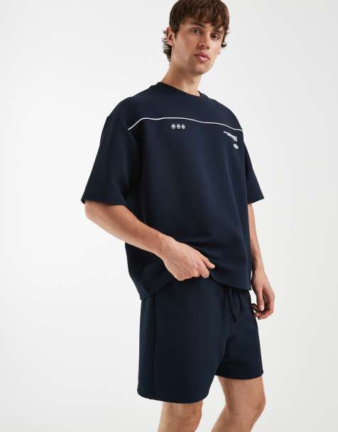 ASOS DESIGN – Marinblå finshorts i texturerad jersey och oversized fit - view 1