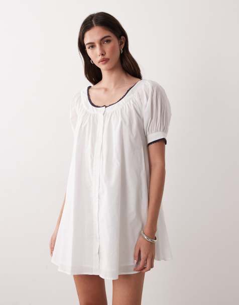 ASOS DESIGN – Marinblå miniklänning i babydoll-modell med knäppning - view 1