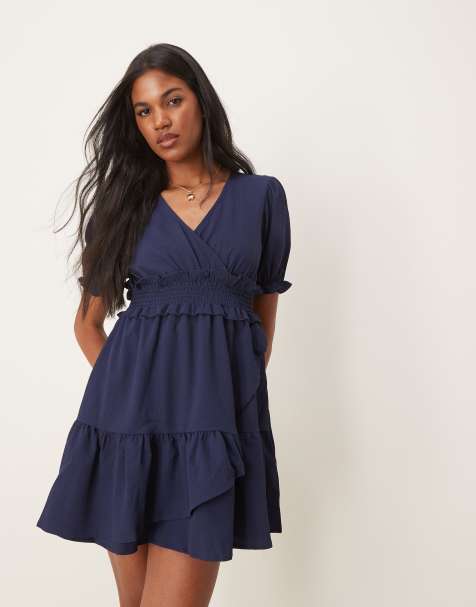ASOS DESIGN – Marinblå miniklänning i omlottdesign med puffärmar - view 1