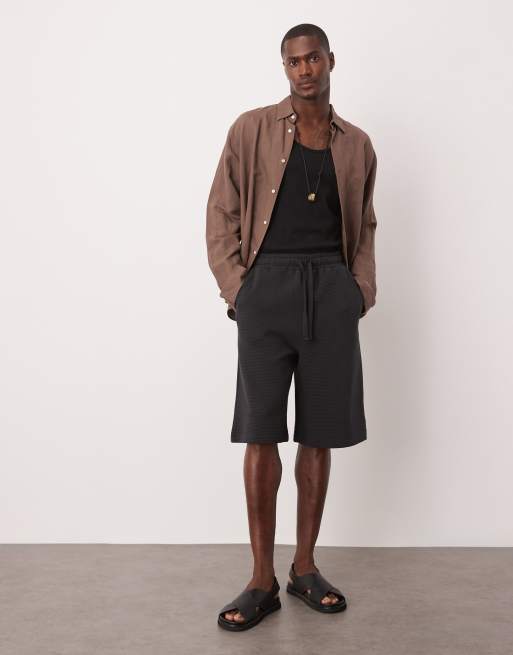 ASOS DESIGN – Marinblå shorts i oversize och lång modell med textur