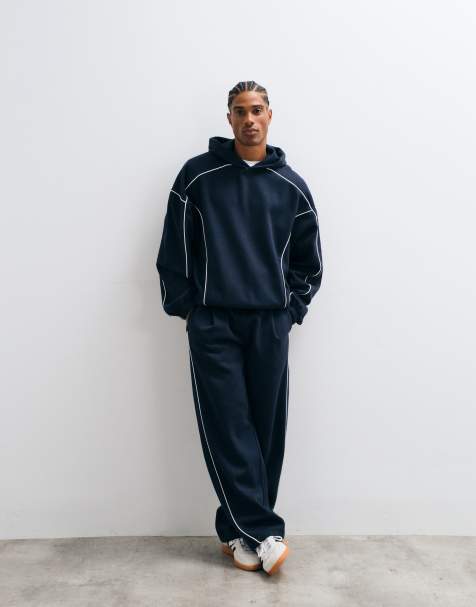ASOS DESIGN – Marinblått set i extra oversize med huvtröja och vida mjukisbyxor med vita passpoaler - view 1