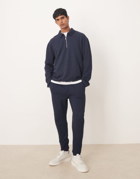 ASOS DESIGN – Marinblått set i pikétyg med pikétröja i oversize med halvlång dragkedja och mjukisbyxor - view 1
