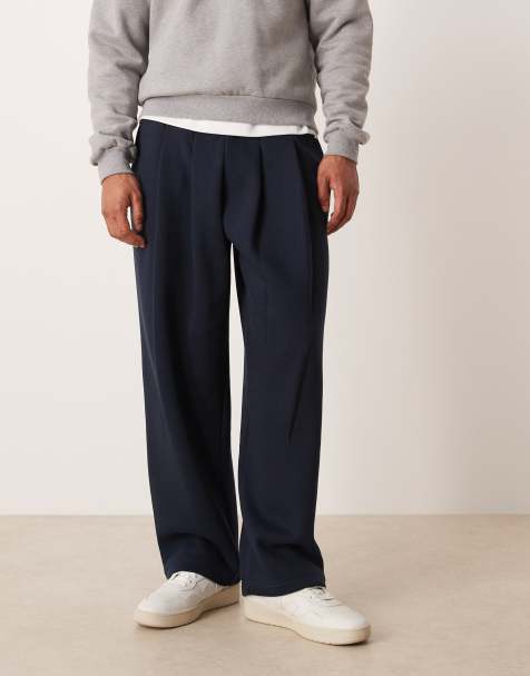 ASOS DESIGN - Marineblå joggingbukser med brede ben og plisseringer - view 1