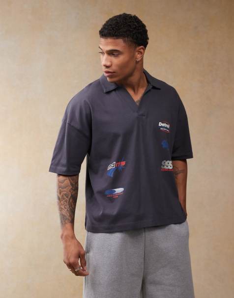 ASOS DESIGN - Marineblå oversized poloskjorte med sænkede skuldre og sportsprint i firkantet pasform - view 1