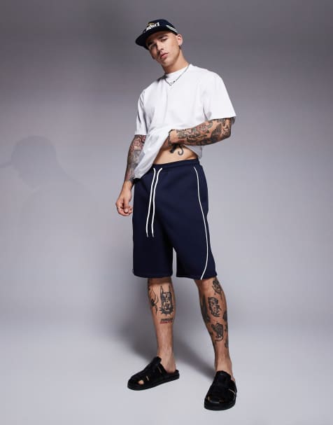 ASOS DESIGN - Marineblå oversized shorts med kantbånd i siden - view 1