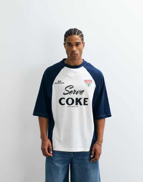 ASOS DESIGN - Marineblå oversized T-shirt med Coca Cola-print i cut-and-sew-design - view 1