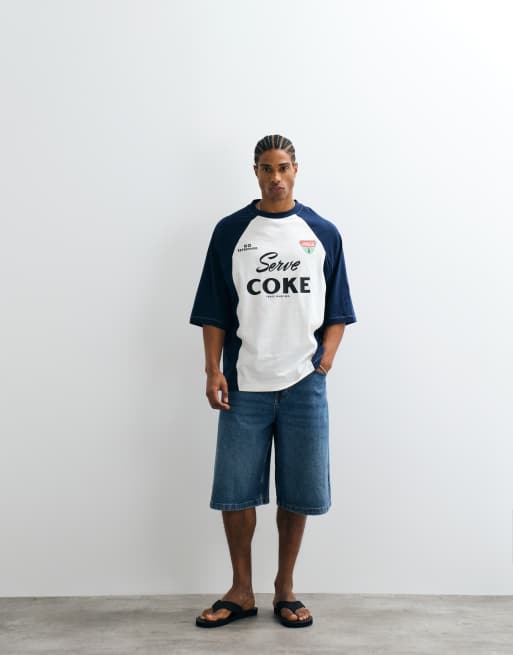 ASOS DESIGN - Marineblå oversized T-shirt med Coca Cola-print i cut-and-sew-design, 2 af 5