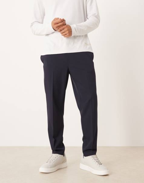 ASOS DESIGN - Marineblå skræddersyede tapered bukser med comfort-stretch og elastisk talje - view 1
