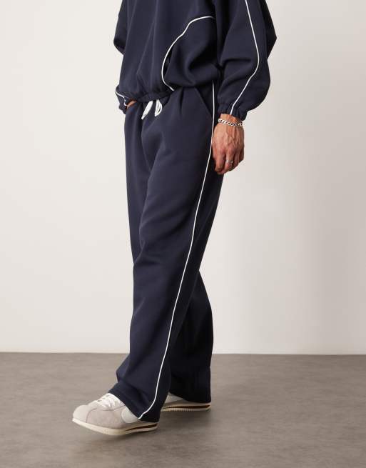 ASOS DESIGN - Marineblå superløstsiddende joggingbukser med kontrasterende kant i siden - Del af sæt