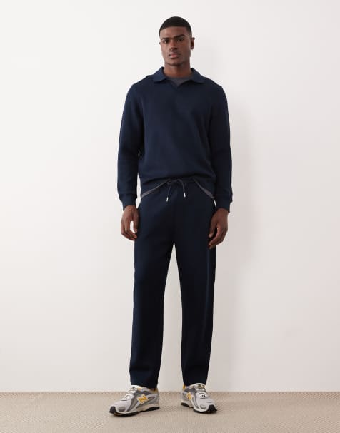 ASOS DESIGN - Marineblå tapered joggingbukser - view 1