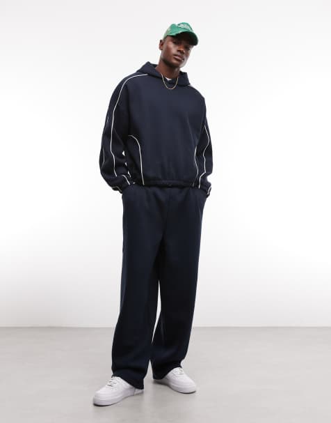 ASOS DESIGN - Marineblåt sæt med ekstremt oversized hættetrøje i firkantet pasform og superposede joggingbukser med kantdetaljer - view 1