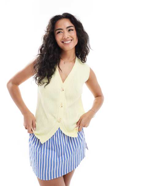 ASOS DESIGN relaxed knitted waistcoat with horn buttons in buttermilk